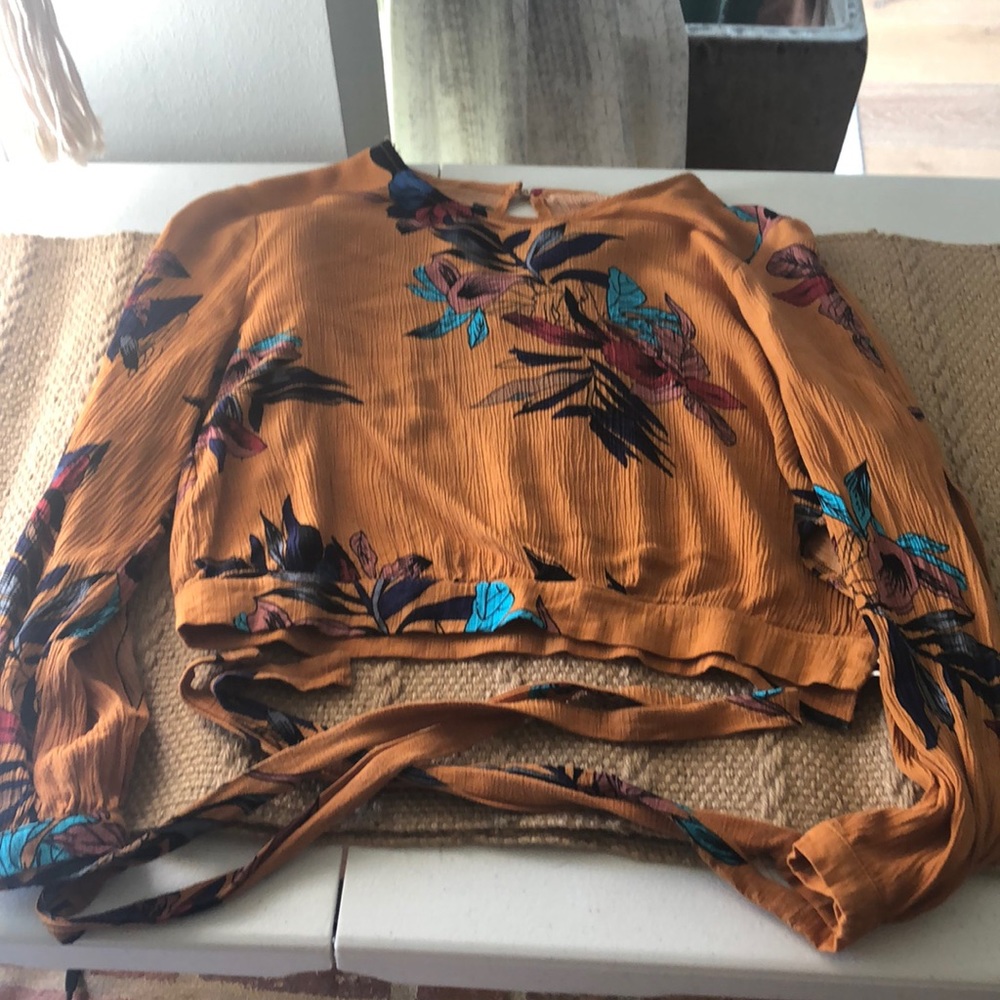 Yellow with detailing and long sleeves
